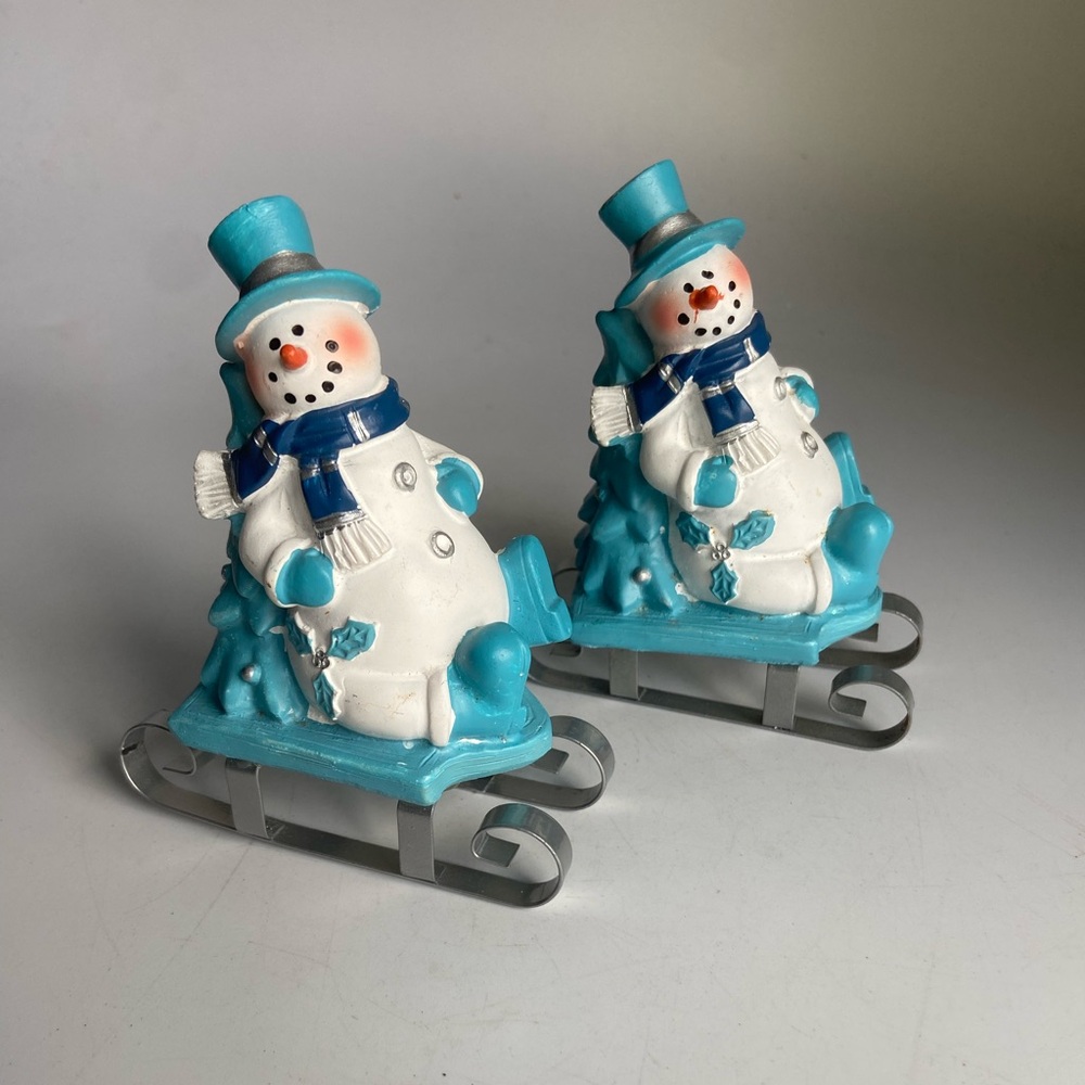 Two S woman Christmas Figurines on Sleds